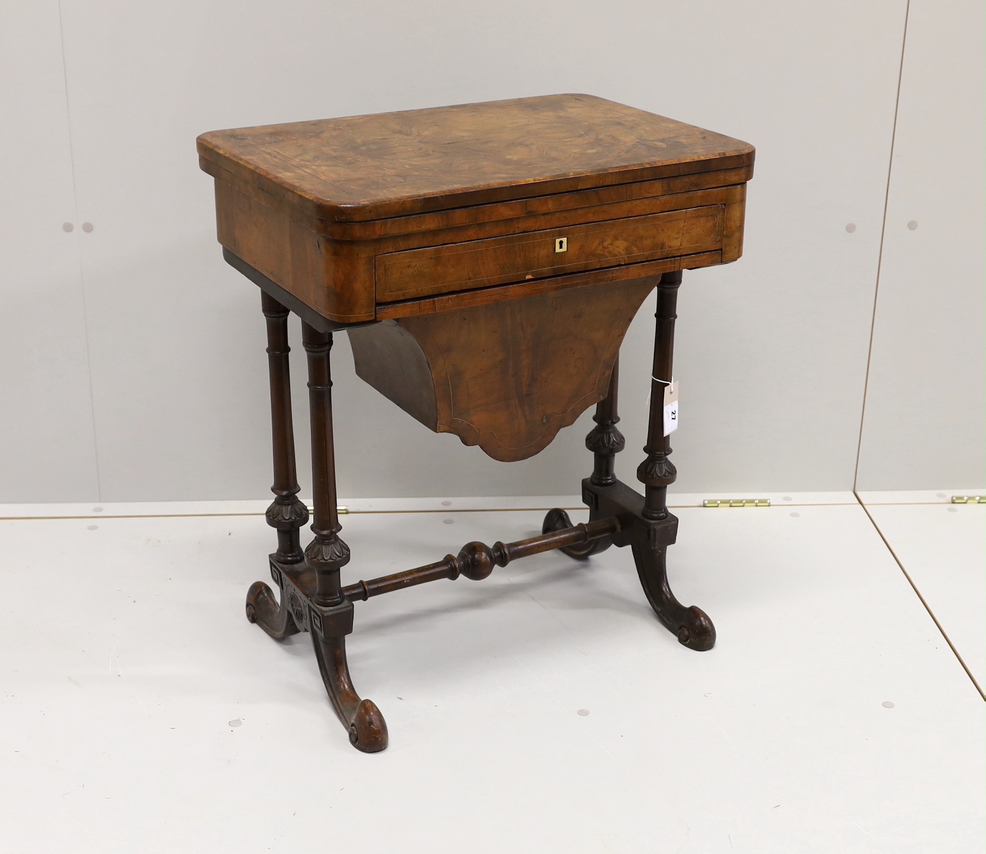 A Victorian figured walnut rectangular sewing / games table, width 58cm, depth 41cm, height 69cm